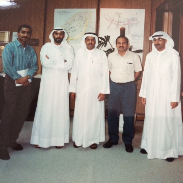group of men posing in Kuwait Ministry of Public Works