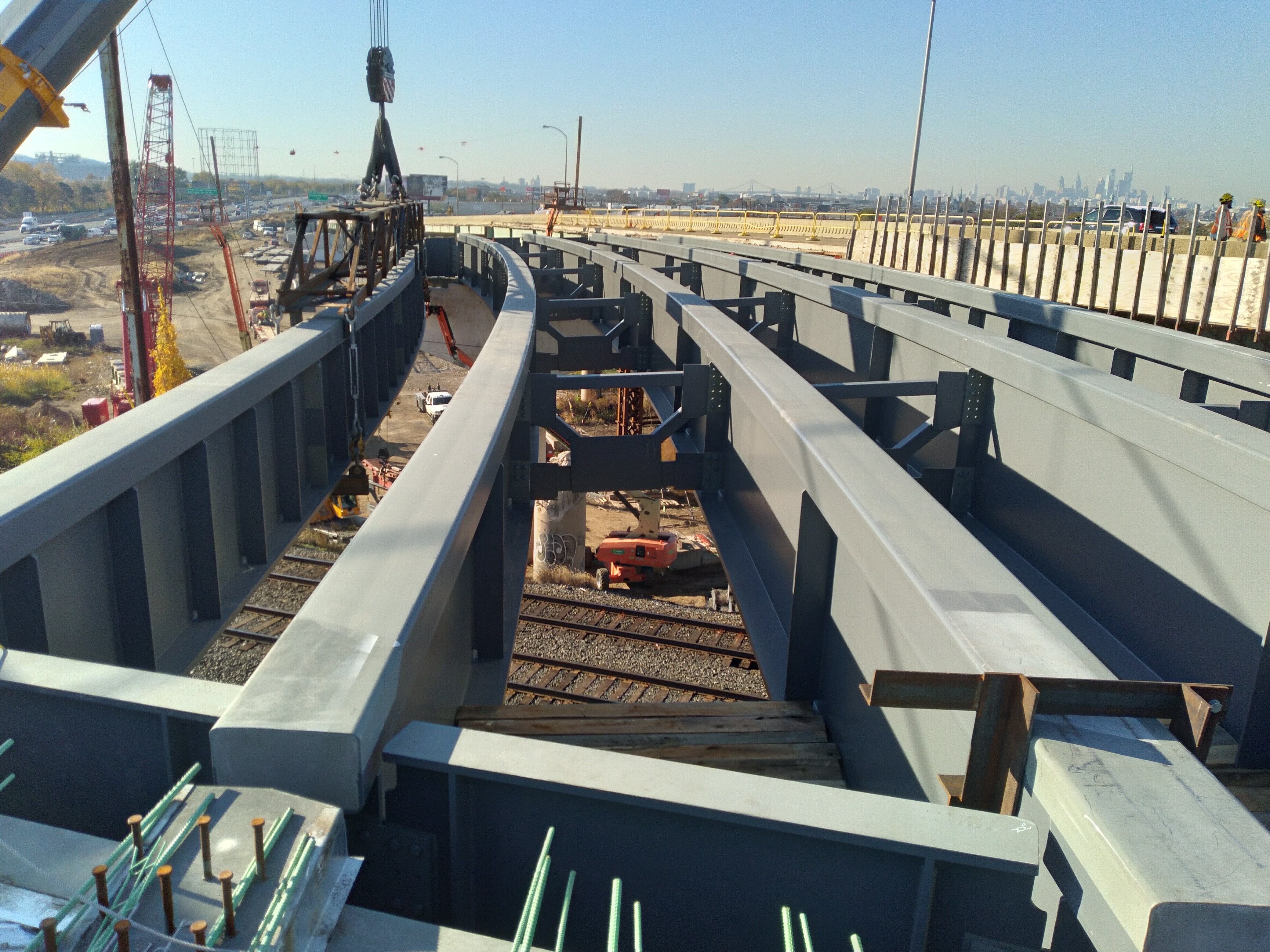 Overhead view of curved steel tubular flange girder construction.