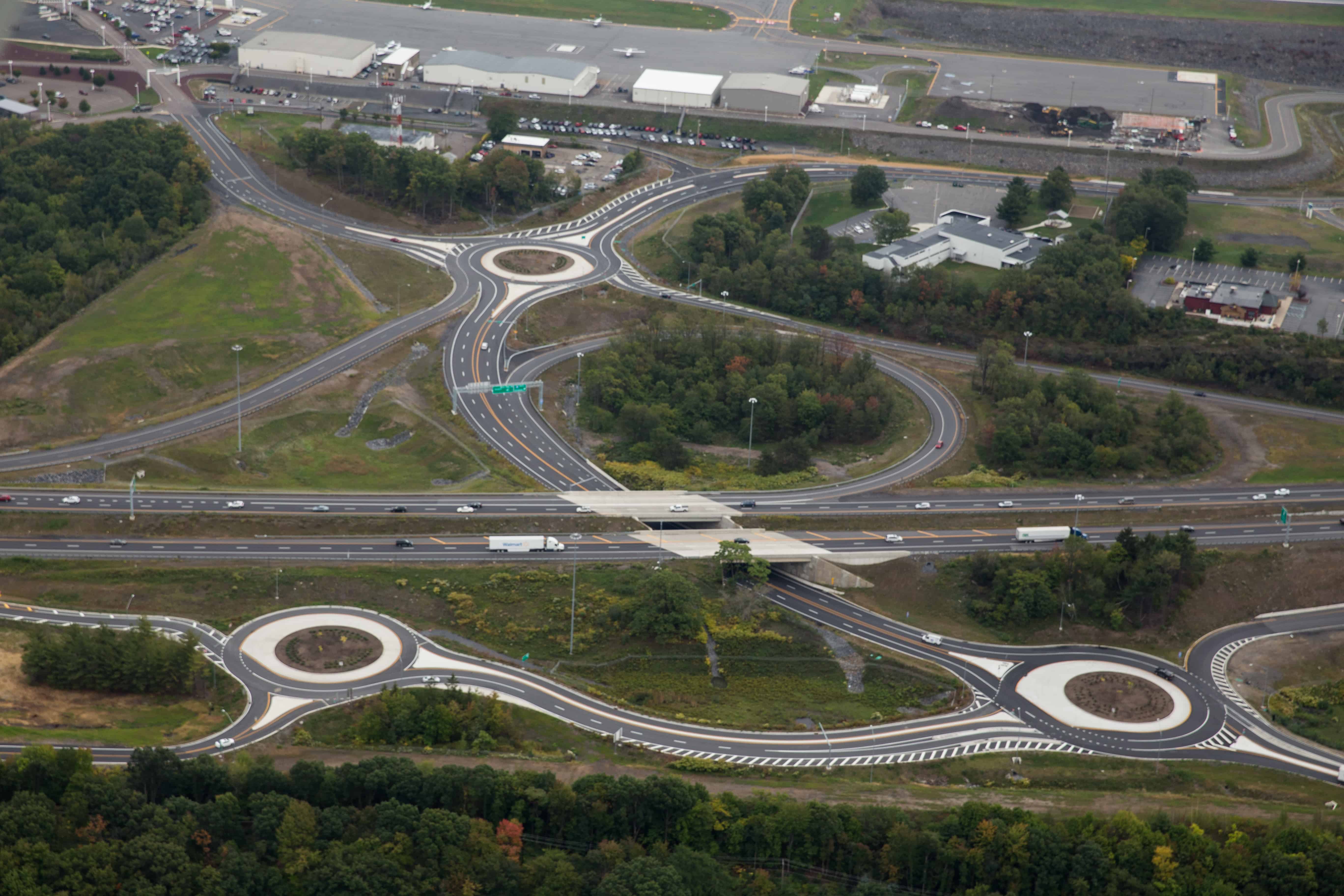 Aerial view of three roundabouts.